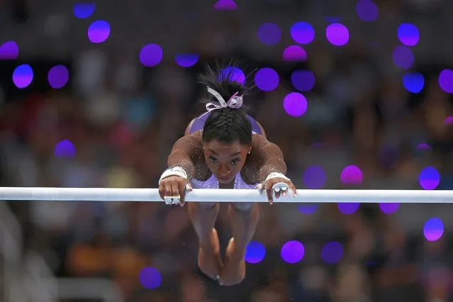 Simone Biles does a practice routine before competing in the uneven bars during Day Two of the U.S. Gymnastics Championships at SAP Center on August 25, 2023 in San Jose, California. (Photo by Ezra Shaw/Getty Images)