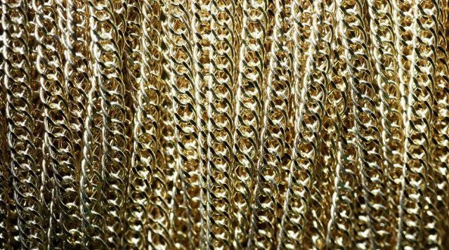 Gold chains are on display at the jewelry department of the Krastsvetmet non-ferrous metals plant, one of the world's largest producers in the precious metals industry, in the Siberian city of Krasnoyarsk, Russia, December 14, 2016. (Photo by Ilya Naymushin/Reuters)
