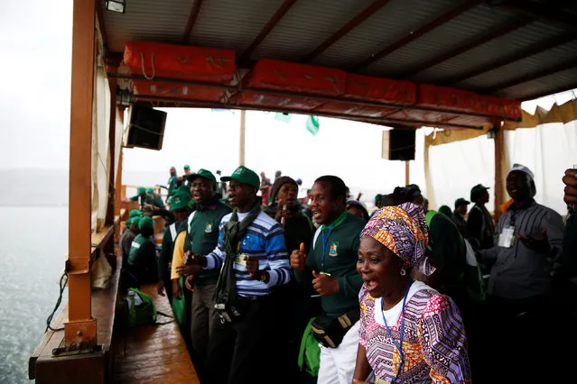 Christian tourists from Nigeria are seen during a boat ride in the Sea of Galilee, northern Israel November 30, 2016. (Photo by Ronen Zvulun/Reuters)