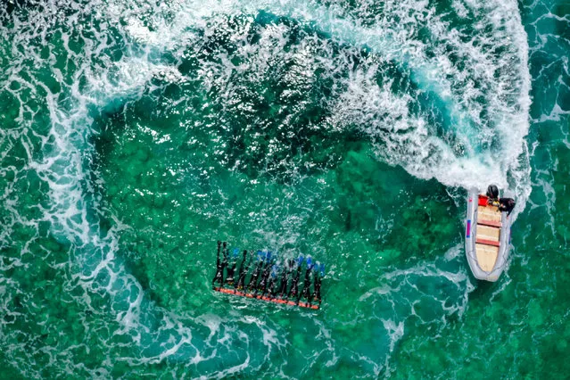 A drone photo shows members of Foca Gendarmerie Commando School and Training Center Command during a military drill offshore Izmir, Turkey on June 23, 2021. (Photo by Halil Fidan/Anadolu Agency via Getty Images)