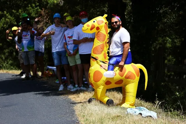 A mounted fan waits during the 108th Tour de France 2021, Stage 15 a 191,3km stage from Céret to Andorre-la-Vieille on July 11, 2021 in Andorre-la-Vieille, Andorra. (Photo by Tim de Waele/Getty Images)