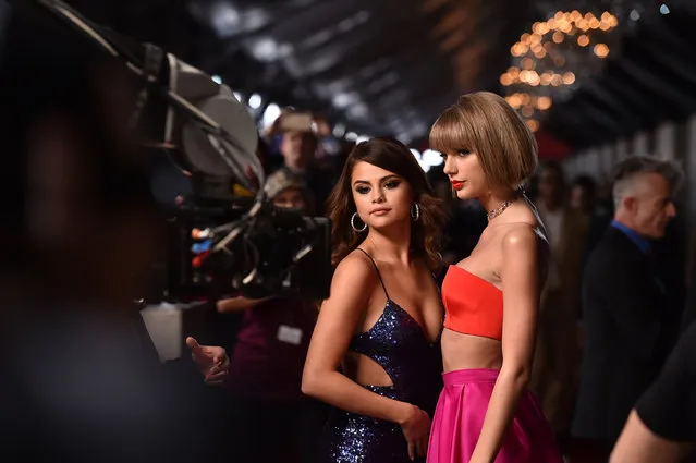 Selena Gomez, left, and Taylor Swift arrive at the 58th annual Grammy Awards at the Staples Center on Monday, February 15, 2016, in Los Angeles. (Photo by Jordan Strauss/Invision/AP Photo)