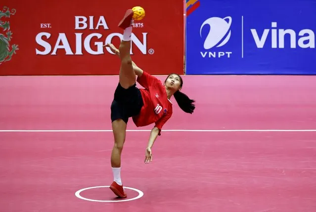 Laos's Namfon Morladok, seen in action during a Malaysia versus Laos sepak takraw match at the Southeast Asian Games, at Hoang Mai Sports Center in Hanoi, Vietnam, on May 14, 2022. (Photo by Navesh Chitrakar/Reuters)