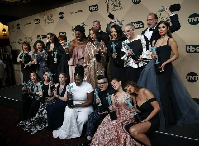 The cast of “Orange is the New Black” poses with the awards they won for Outstanding Performance by an Ensemble in a Comedy Series backstage at the 23rd Screen Actors Guild Awards in Los Angeles, California, U.S., January 29, 2017. (Photo by Mario Anzuoni/Reuters)