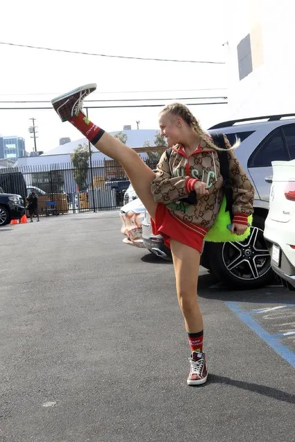 JoJo Siwa all fired up as she heads into practice in Los Angeles on October 6, 2021. The teen gets into it with some kicks and shows how excited she is for week 4 of Dancing with the Stars. (Photo by The Mega Agency)