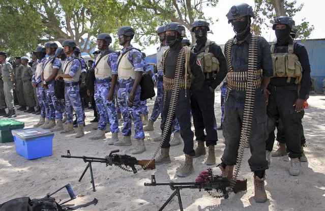 Somali soldiers prepare to secure the capital on the eve of presidential elections, at a police academy in Mogadishu, Somalia Tuesday, February 7, 2017. Graft – vote-buying, fraud, intimidation – is the top concern in a nation that Transparency International now rates as the most corrupt in the world and Mogadishu is in lockdown because of the threat of violence by homegrown Islamic extremist group al-Shabab. (Photo by Farah Abdi Warsameh/AP Photo)