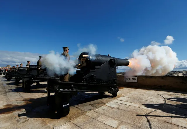 Malta Heritage Trust historical re-enactors, in World War One-era Royal Malta Artillery uniforms, fire the cannons in a general salute to mark the feast of Saint Paul's Shipwreck at the Upper Barrakka Saluting Battery, in Valletta, Malta February 10, 2017. (Photo by Darrin Zammit Lupi/Reuters)