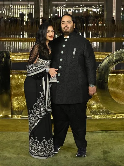 Mukesh Ambani's son Anant Ambani with Indian classical dancer Radhika Merchant during the inauguration of the Nita Mukesh Ambani Cultural Centre (NMACC), at Bandra-Kurla Complex (BKC), Bandra (East), on March 31, 2023 in Mumbai, India. Nita Ambani's dream project, which is housed within the Jio Global Centre in Bandra-Kurla Complex, aims to preserve and promote Indian arts. The event saw the presence of prominent celebrities and businessmen. (Photo by Vijay Bate/Hindustan Times via Getty Images)