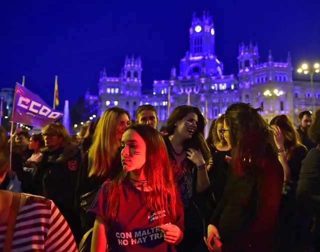 A group of women take part in a rally on the International Women's Day on March 8, 2017 in Madrid. (Photo by Gerard Julien/AFP Photo)