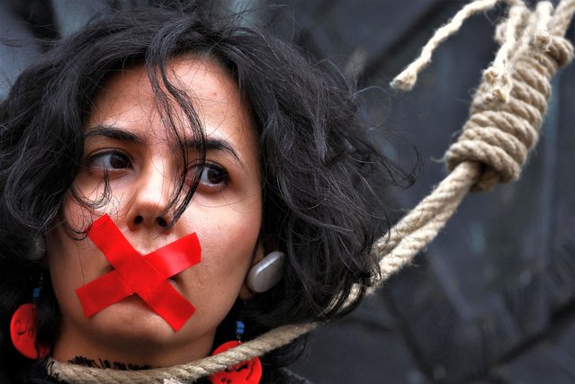 A supporter of the Iranian women life freedom movement takes part in a demonstration, during the Munich Security Conference (MSC) in Munich, Germany on February 18, 2023. (Photo by Kai Pfaffenbach/Reuters)