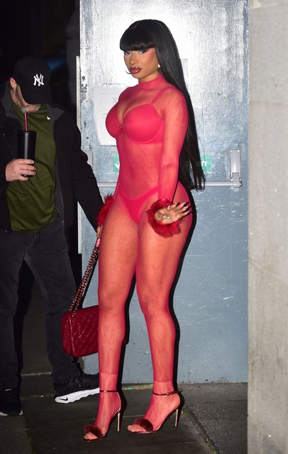 American rapper Megan Thee Stallion wows in see through jumpsuit while enjoying night out in Manchester City centre on July 13, 2024. (Photo by KIERAN/Splash News and Pictures)