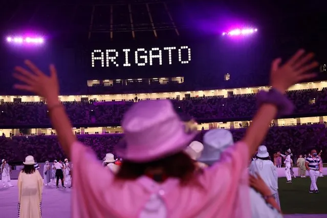 The word “Arigato”, Japanese for “Thank You”, is displayed during the closing ceremony of the Tokyo 2020 Olympic Games, at the Olympic Stadium, in Tokyo, on August 8, 2021. (Photo by Antonio Bronic/Reuters)