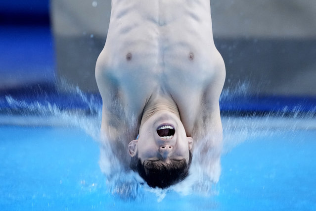 South Korea's Shin Jung-whi competes in the men's 10m platform diving preliminary, at the 2024 Summer Olympics, Friday, August 9, 2024, in Saint-Denis, France. (Photo by Lee Jin-man/AP Photo)