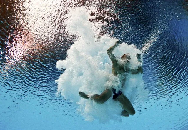 Oleksandr Gorshkovozov of Ukraine performs a jump during the mixed team event final at the Aquatics World Championships in Kazan, Russia July 29, 2015. (Photo by Stefan Wermuth/Reuters)