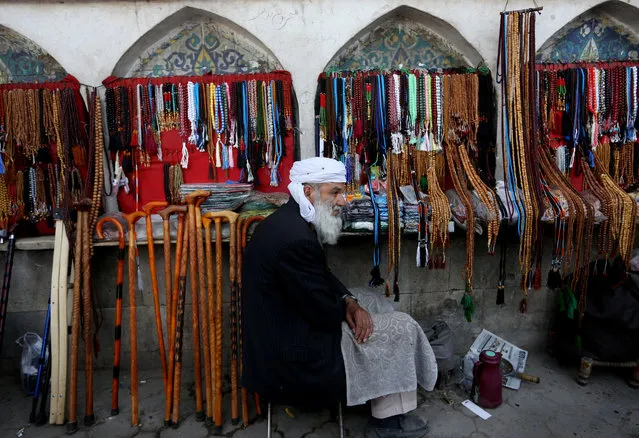 An Afghan vendor waits for customers ahead of the upcoming Muslim holy fasting month of Ramadan, in Kabul, Afghanistan, Sunday, June 5, 2016. (Photo by Rahmat Gul/AP Photo)