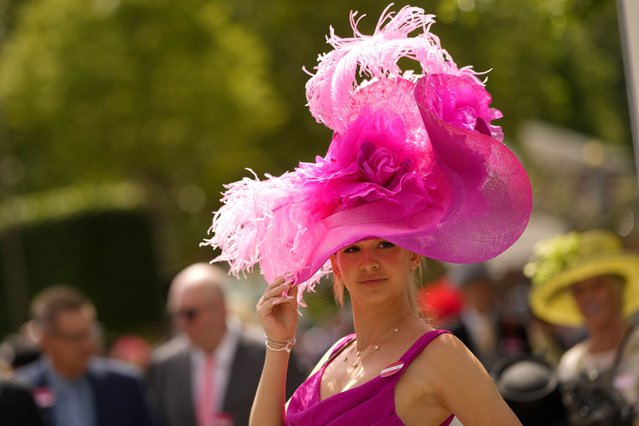 Racegoer Maria Tutus poses for photographers during Ladies Day of the Royal Ascot horse racing meeting, at Ascot Racecourse in Ascot, England, Thursday, June 22, 2023. (Photo by Alastair Grant/AP Photo)