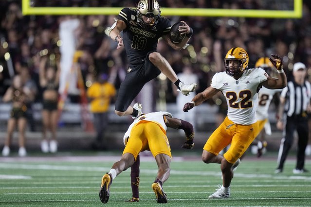 Texas State wide receiver Joey Hobert (10) leaps over Arizona State defensive back Myles Rowser (4) during the second half of an NCAA college football game in San Marcos, Texas, Thursday, September 12, 2024. (Photo by Eric Gay/AP Photo)