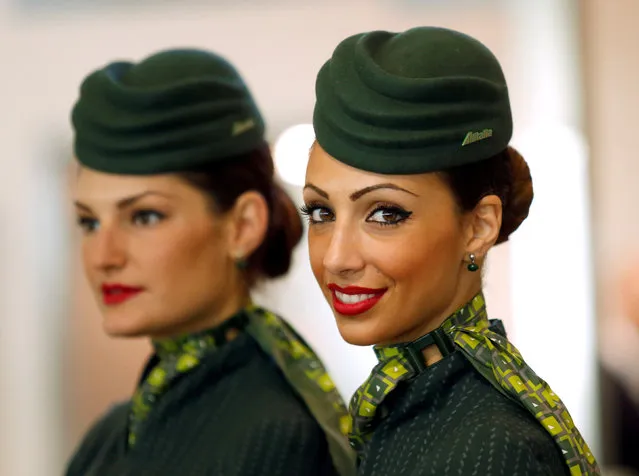 Alitalia's hostesses are seen during the official presentation of the direct connection from Rome to Mexico City at the Leonardo da Vinci-Fiumicino Airport in Rome, Italy June 16, 2016. (Photo by Remo Casilli/Reuters)