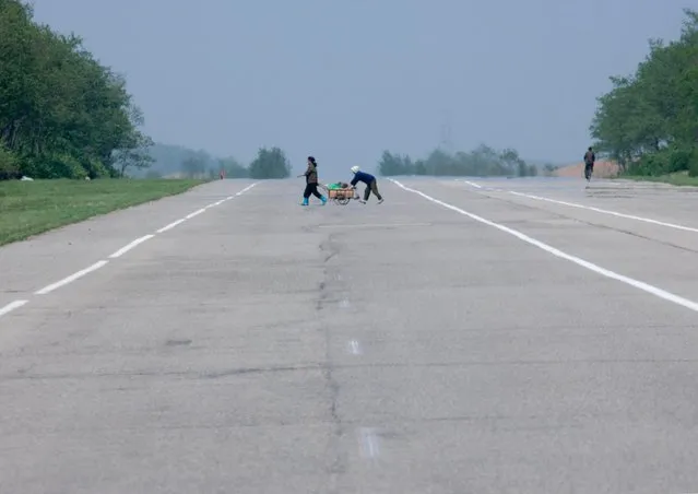 The highways are so large that planes could land on them. (Photo by Eric Lafforgue/Exclusivepix Media)