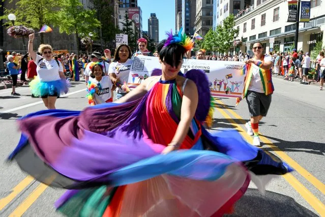 Revellers take part in pride celebrations in Columbus, Ohio, U.S., June 18, 2022. (Photo by Gaelen Morse/Reuters)