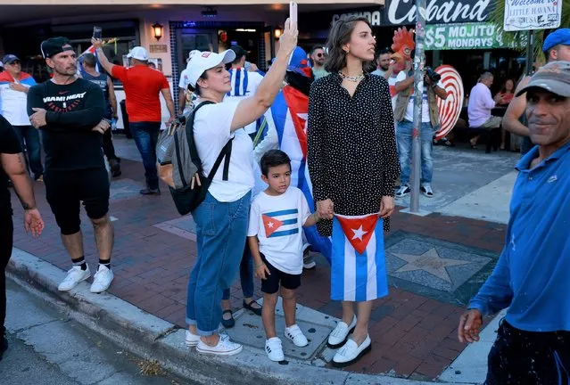 Protesters commemorate the one year anniversary of the July 11th protests in Cuba on July 11, 2022 in Miami, Florida.  The event, held  in Miami’s Little Havana neighborhood honored those that took part in street demonstrations that spread across Cuba, protesting the lack of food, opportunity, and a need for freedom. (Photo by Joe Raedle/Getty Images)