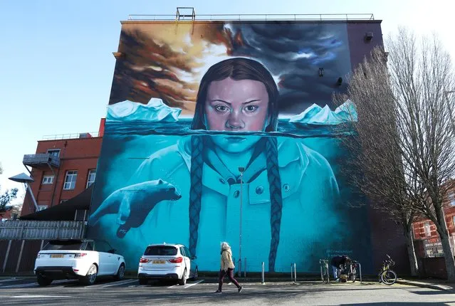 A mural of Greta Thunberg is seen on the side of a building, in Bristol, Britain, February 27, 2020. (Photo by Peter Nicholls/Reuters)