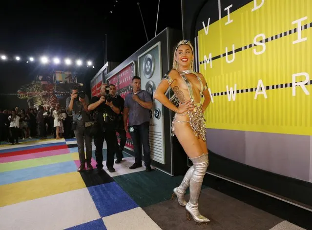 Show host Miley Cyrus poses as she arrives at the 2015 MTV Video Music Awards in Los Angeles, California August 30, 2015. (Photo by Mario Anzuoni/Reuters)