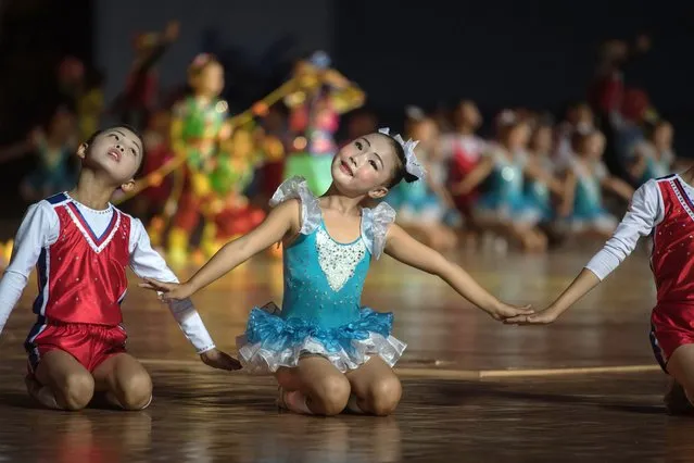 Child perform during the ITF World Taewondo Championships in Pyongyang, North Korea on September 21, 2017. (Photo by Ed Jones/AFP Photo)