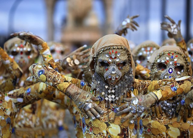 People disguised as fantastic creatures take part in the traditional “Three Wise Men Parade” in Cordoba, Spain, 05 January 2024. The traditional parade to welcome the Three Wise Men, that according to the Bible visited Jesus after his birth, is held on the eve of Three Wise Men Day, when children in Spain traditionally receive their Christmas presents. (Photo by Salas/EPA)