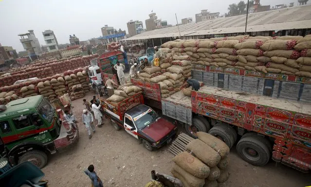 An overview of a transit depot where trucks bound for Afghanistan are loaded in Peshawar, Pakistan September 15, 2015. (Photo by Fayaz Aziz/Reuters)