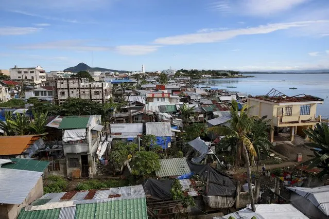 A view of a coastal village with most houses rebuilt after Typhoon Haiyan devastated a coastal village in Tacloban city in central Philippines November 2, 2015, ahead of the second anniversary of the devastating typhoon that killed more than 6,000 people in central Philippines. (Photo by Erik De Castro/Reuters)