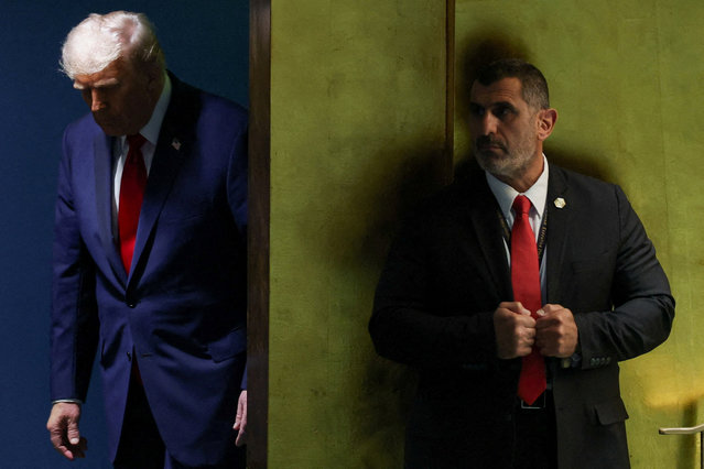 U.S. President Donald Trump walks to address the General Assembly, on September 23, 2025. (Photo by Mike Segar/Reuters)