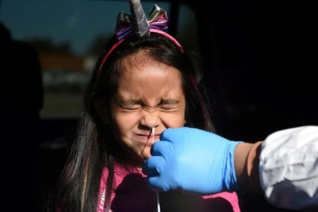 Valerie Dominguez, whose results came back negative, is tested for coronavirus disease (COVID-19) at United Memorial Medical Center in Houston, Texas, U.S., December 9, 2020. (Photo by Callaghan O'Hare/Reuters)