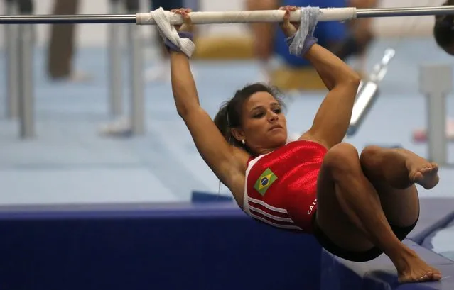 Brazilian gymnast Jade Barbosa is seen during a training session at the new Brazilian Artistic Gymnastics Center in Rio de Janeiro January 16, 2015. The Artistic Gymnastics Center is where gymnasts are preparing for the 2016 Olympics. (Photo by Sergio Moraes/Reuters)