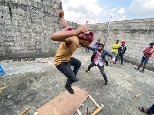Members of the group “Xcel Theatre”, which hopes to boost interest for action films in Nollywood, imitate scenes from a Chinese action film in Port Harcourt, Nigeria on January 8, 2021. (Photo by Seun Sanni/Reuters)
