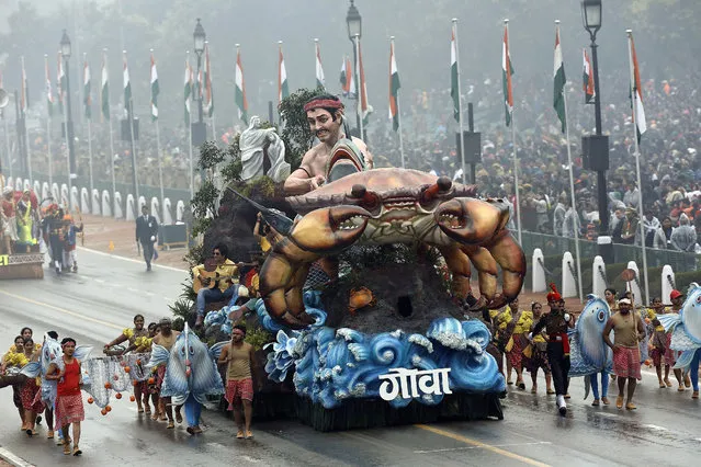 A float from the Indian state of Goa rolls down at  Rajpath during the 66th Republic day function in New Delhi, India on 26 January 2015. President Obama is the first United States president to be guest of honour at India's annual Republic Day parade. (Photo by Harish Tyagi/EPA)