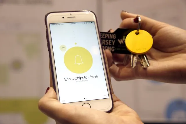 A Chipolo, a wireless item tracker, is displayed during "CES Unveiled," a preview event of the 2016 International CES trade show, in Las Vegas, Nevada January 4, 2016. The Bluetooth-enabled Chipolo can be tracked using your smartphone. Shaking a Chipolo ($29.95) will make your phone ring, in the event that you can find the Chipolo but not your phone. (Photo by Steve Marcus/Reuters)