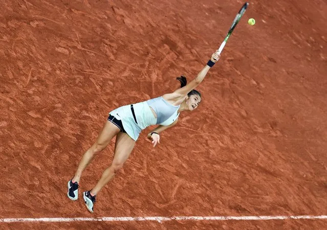 Emma Raducanu of Great Britain serves against Linda Noskova of Czech Republic during the Women's Singles First Round match on day two of The 2022 French Open at Roland Garros at Roland Garros on May 23, 2022 in Paris, France. (Photo by Shi Tang/Getty Images)