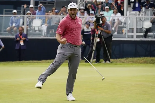 Jon Rahm, of Spain, reacts to making his birdie putt on the 18th green during the final round of the U.S. Open Golf Championship, Sunday, June 20, 2021, at Torrey Pines Golf Course in San Diego. (Photo by Gregory Bull/AP Photo)