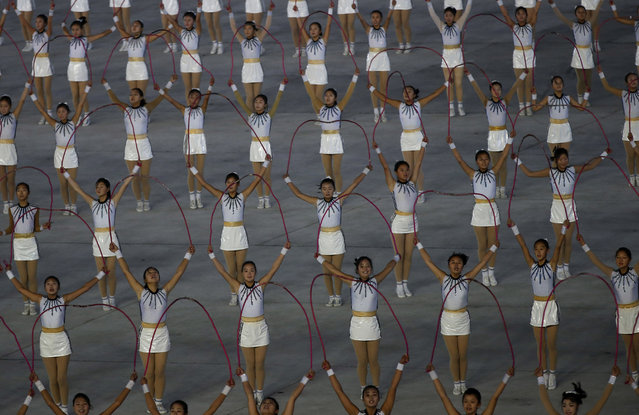 Dancers perform during “The Glorious Country” mass games at May Day Stadium in Pyongyang, North Korea, Thursday, October 25, 2018. North Korea has extended the run of the iconic mass games, which it revived last month to mark the country's 70th birthday. (Photo by Dita Alangkara/AP Photo)
