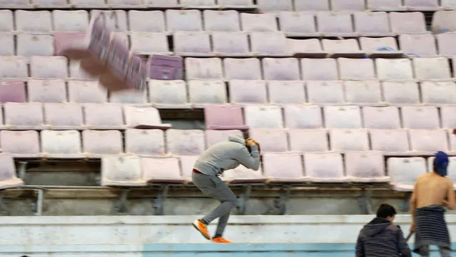 Football Soccer, Club Africain vs PSG, International friendly, Rades Stadium in Tunis, Tunisia on January 4, 2017. A Club Africain fan reacts during a fight. (Photo by Zoubeir Souissi/Reuters)