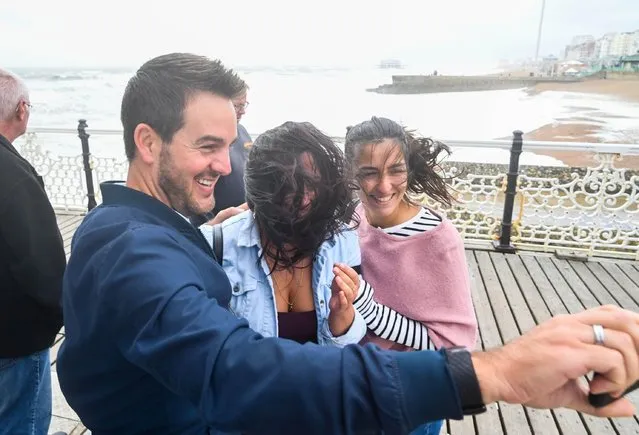 Not a great day to capture a selfie in Brighton, United Kingdom on July 30, 2021, as Storm Evert sweeps across the country with wind speeds forecast to be up to 60mph in some areas. (Photo by Simon Dack/Alamy Live News)