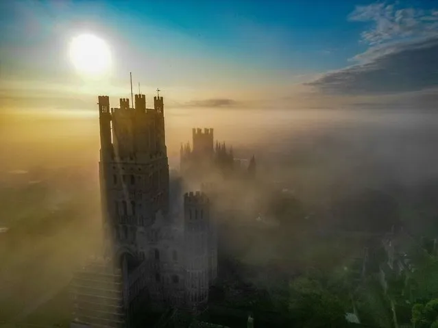 The picture dared July 20, 2023 shows mist around Ely Cathedral in Cambridgeshire, East of England at sunrise this morning. (Photo by Glynis Pierson/Bav Media)