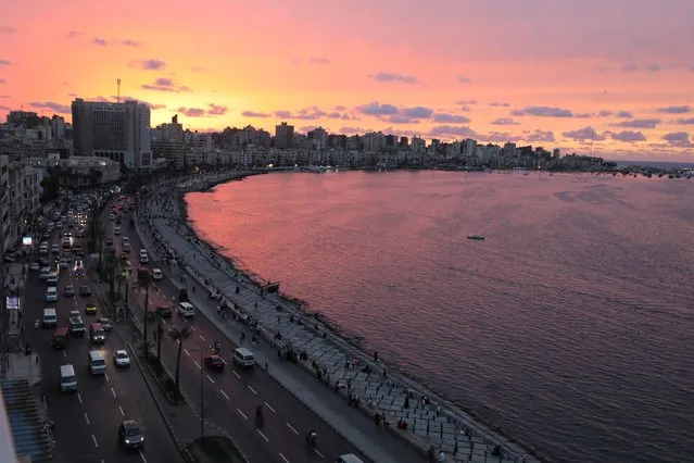 A picture taken from a highrise hotel window shows an aerial view of the Mediterranean sea from Corniche of Alexandria, Egypt, 30 September 2023. The second largest city in Egypt is famous for its public beaches, the range of cheap and expensive hotels, and the affordability of its rental apartments, which make Alexandria an attractive internal tourism destination. (Photo by Khaled Elfiqi/EPA)