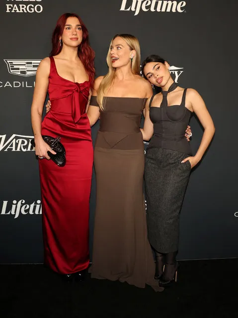 Australian actress Margot Robbie, American actress Ariana Greenblatt and English-Albanian singer and songwriter Dua Lipa attend Variety's Power of Women event in Los Angeles, California on November 17, 2023. (Photo by Mario Anzuoni/Reuters)