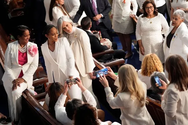 Democratic members of Congress, wearing white to support reproductive rights, pose for a photo before President Joe Biden delivers the State of the Union address to a joint session of Congress at the U.S. Capitol, Thursday March 7, 2024, in Washington. (Photo by Andrew Harnik/AP Photo)
