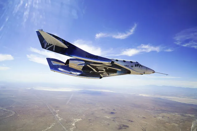 This May 29, 2018 photo provided by Virgin Galactic shows the VSS Unity craft during a supersonic flight test. The spaceship isn’t launched from the ground but is carried beneath a special aircraft to an altitude around 50,000 feet (15,240 meters). There, it’s released before igniting its rocket engine and climbing. (Photo by Virgin Galactic via AP Photo)