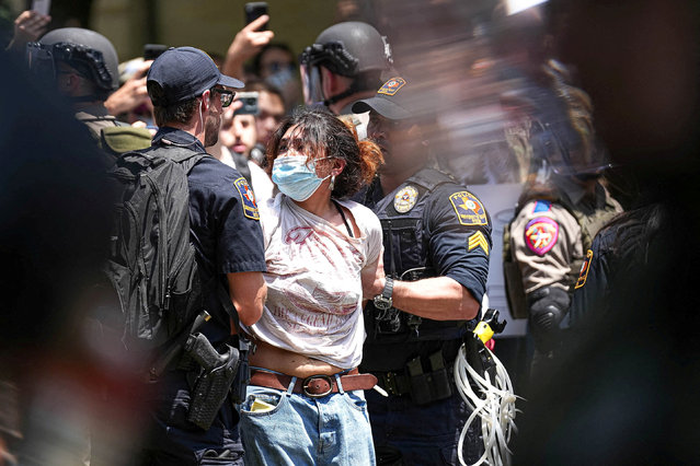 Police arrest a pro-Palestinian protester, during the ongoing conflict between Israel and the Palestinian Islamist group Hamas, at the University of Texas in Austin, Texas, U.S. April 29, 2024. (Photo by Aaron E. Martinez/American-Statesman/USA Today Network via Reuters)