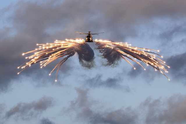 In this image released on Thursday, February 29, 2024, a Merlin helicopter from 820 Naval Air Squadron loaded and fired flares from HMS Prince of Wales, while embarked for NATO Exercise Steadfast Defender. (Photo by L Phot Stuart Dickson/British Ministry of Defence via AP Photo)
