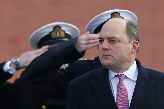 British Defence Secretary Ben Wallace takes part in a wreath-laying ceremony at the Tomb of the Unknown Soldier by the Kremlin Wall in Moscow, Russia on February 11, 2022. (Photo by Maxim Shemetov/Reuters)